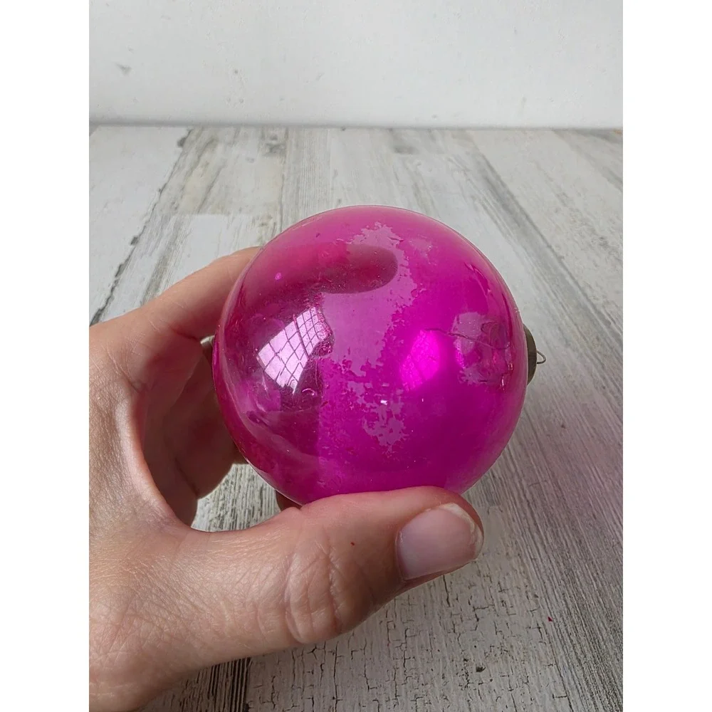 Vintage unsilvered pink glass ornament made in the US of A Xmas tree